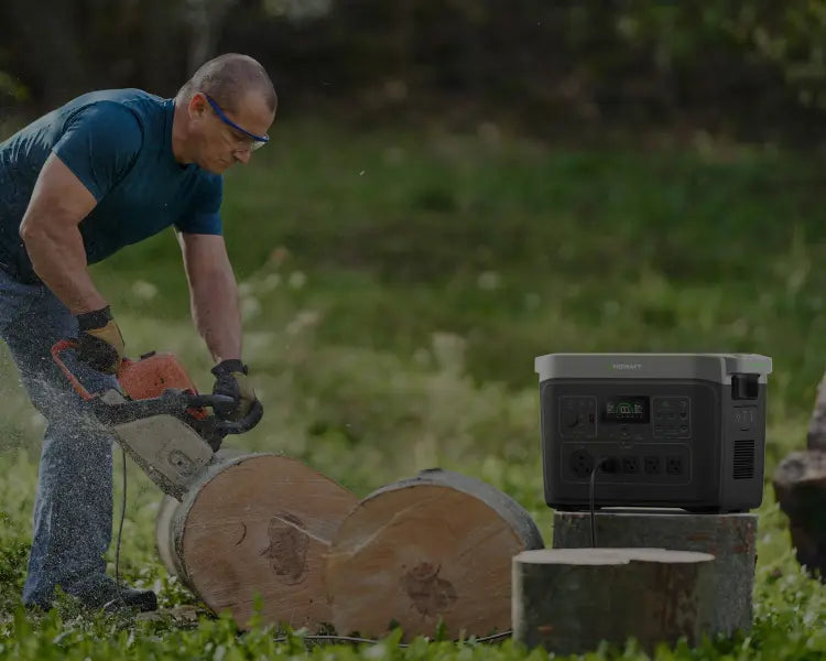 A worker is using a portable power station power chainsaw